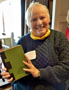 Libby Purves with Dan Houston's much-repaired family heirloom first edition of WD, Marathon Reading, Pin Mill, 21 Oct 2017. Photo by Dan Houston.